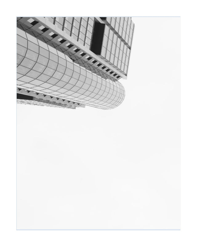 Black and white architectural photograph of a modern curved glass building, shown as a square art print with a thin white border on a white background.