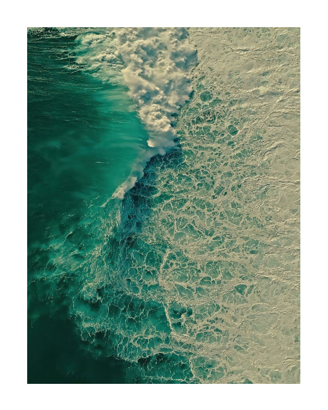 Aerial view of ocean waves with deep teal water on the left and foamy white surf on the right, presented as a square art print with a white border.