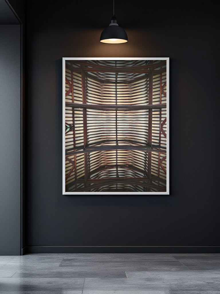 A framed abstract art print featuring a perspective view of wooden slats, displayed on a dark charcoal wall under a hanging black lamp.