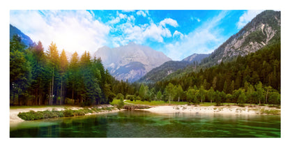A scenic landscape print featuring a mountain lake with a sandy shore, dense green pine forests, and a bright blue sky with white clouds.
