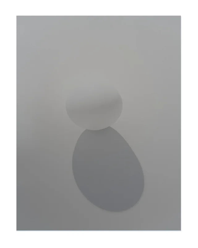 A minimalist abstract art print featuring a white table tennis ball, soft gray teardrop shadow against a light gray background.