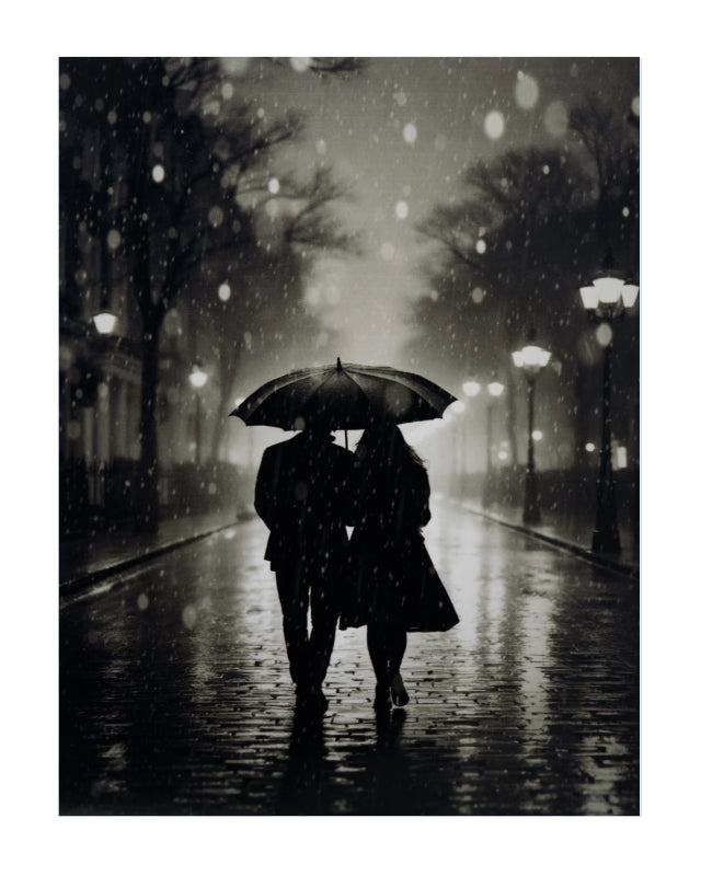 A black and white photograph print depicting a couple walking hand in hand under a single umbrella on a wet city street during a rainy night, with blurred streetlights and falling raindrops.