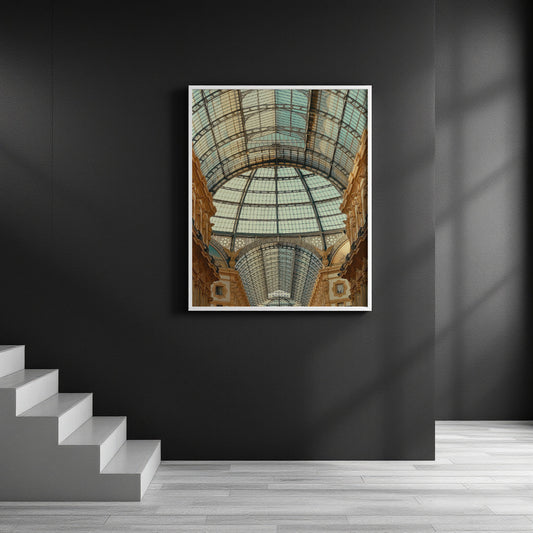 A framed art print depicting an upward view of a grand glass-domed hall, displayed on a dark gray wall in a modern interior setting with gray stairs and light wood flooring.