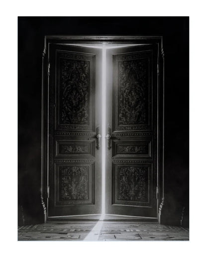 A black and white art print depicting ornate double doors with a bright beam of light shining through the center, casting a reflection on the floor.